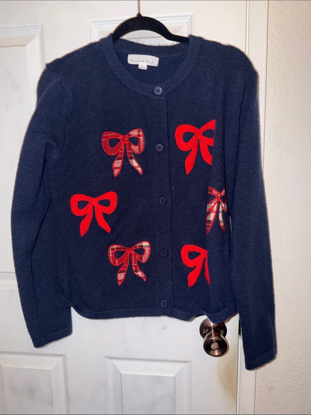 Navy Cardigan with Red Bow Appliqués